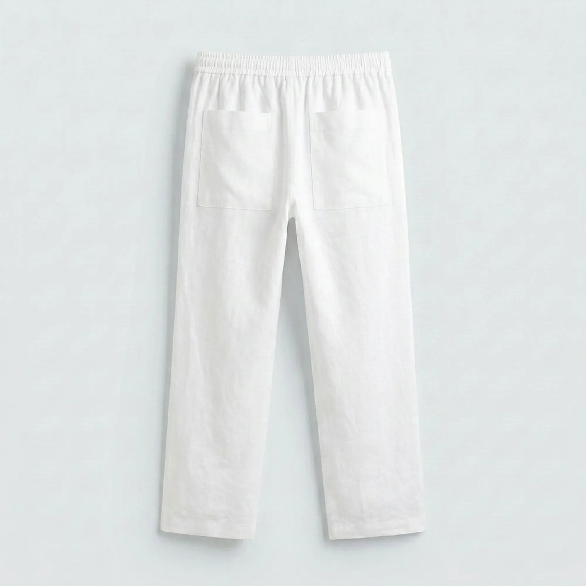 Dos du pantalon en lin blanc coupe relaxed chic — Rivenza