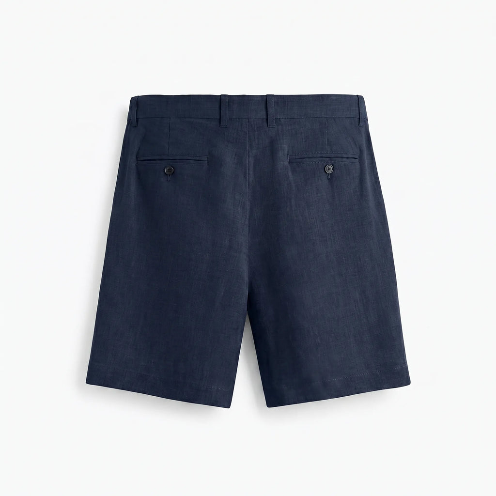 Dos du short en lin opaque bleu marine avec poches passepoilées — Rivenza